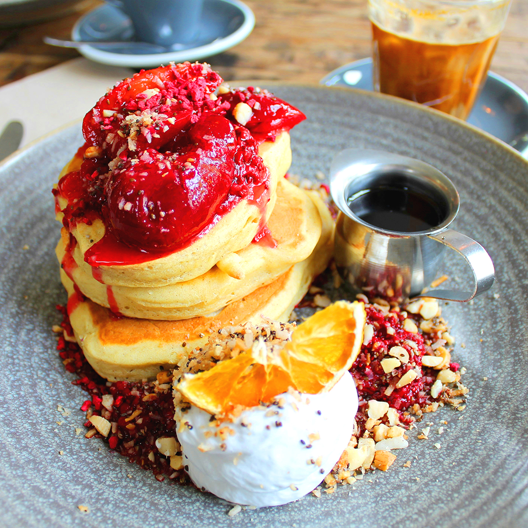 Fluffy Pancakes, Fruit Jam, and Orange Slice