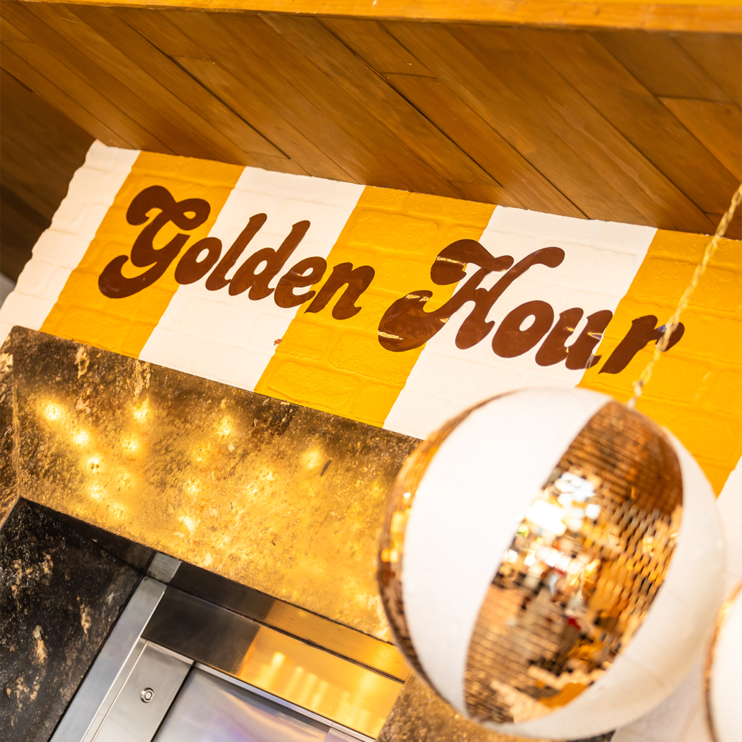 Yellow and gold "Golden Hour" sign